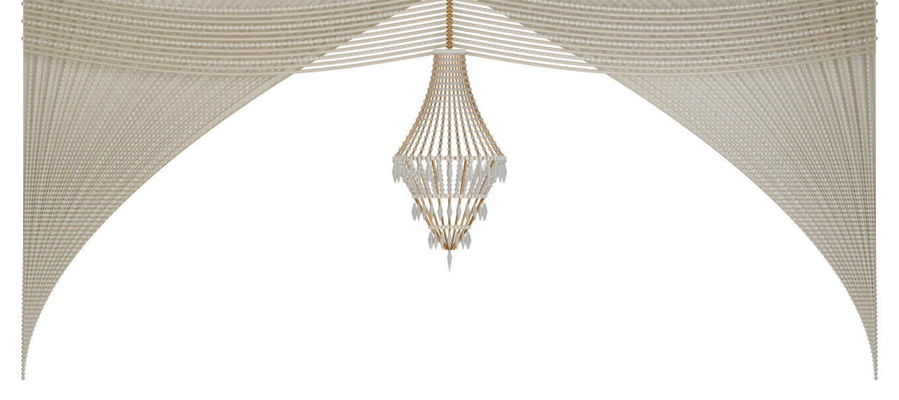 An illuminated crystal chandelier with cascading pearl drapes